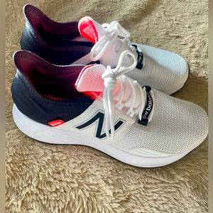 New balance. White with black & pink details. Size: 8.5